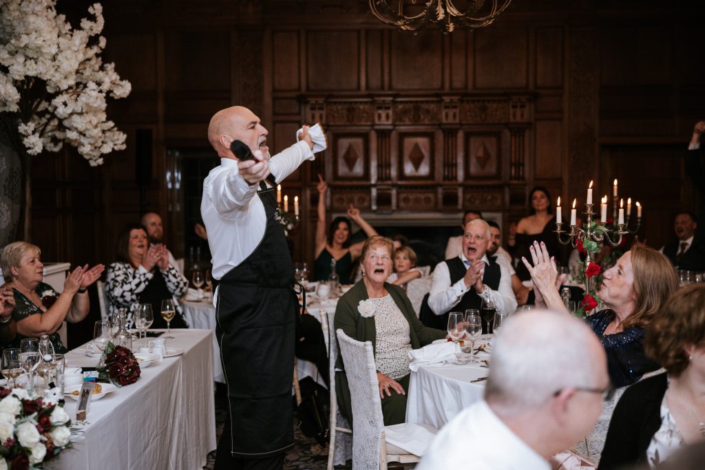 singing waiters taking a bow